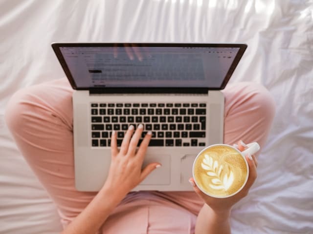 Person using a laptop to research Baltimore’s rental market