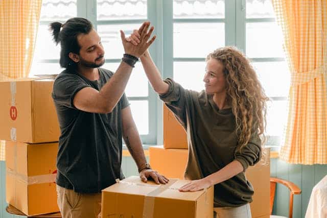 Happy couple after moving in